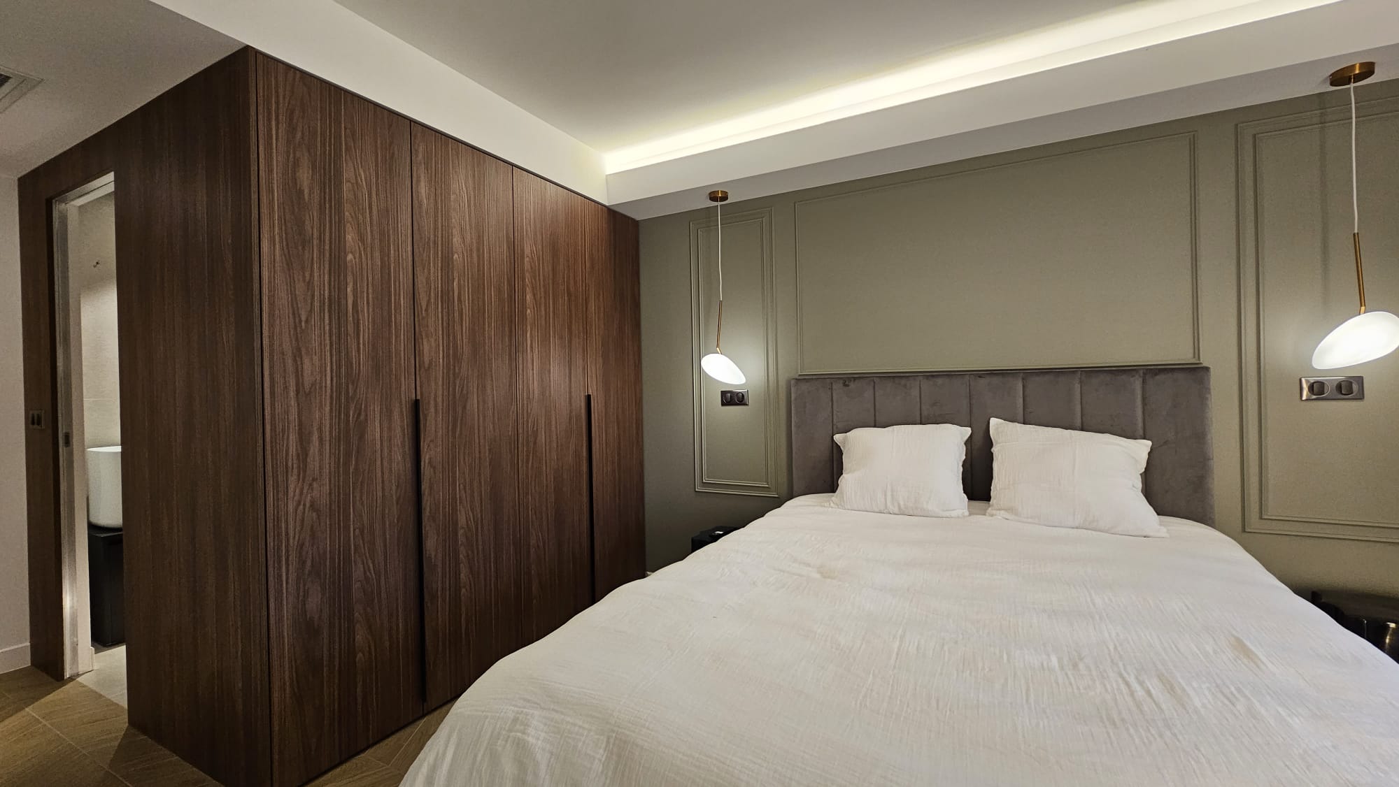 Apartment renovation: chair rail headboard