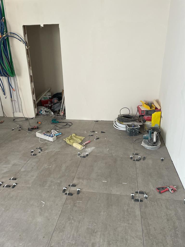 Renovation: floor tile installation (view 2)